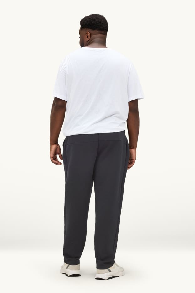 Bărbați - Pantaloni de trening - negru