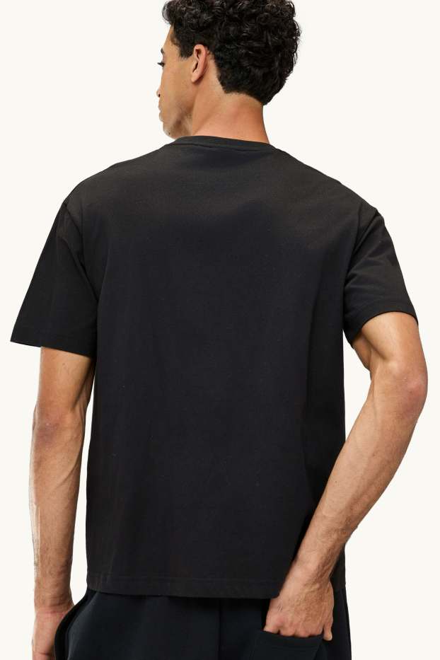 Uomo - T-shirt - relaxed fit - nero