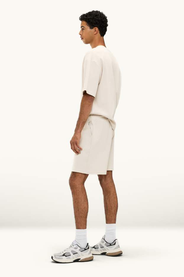 Uomo - Shorts di felpa - beige chiaro