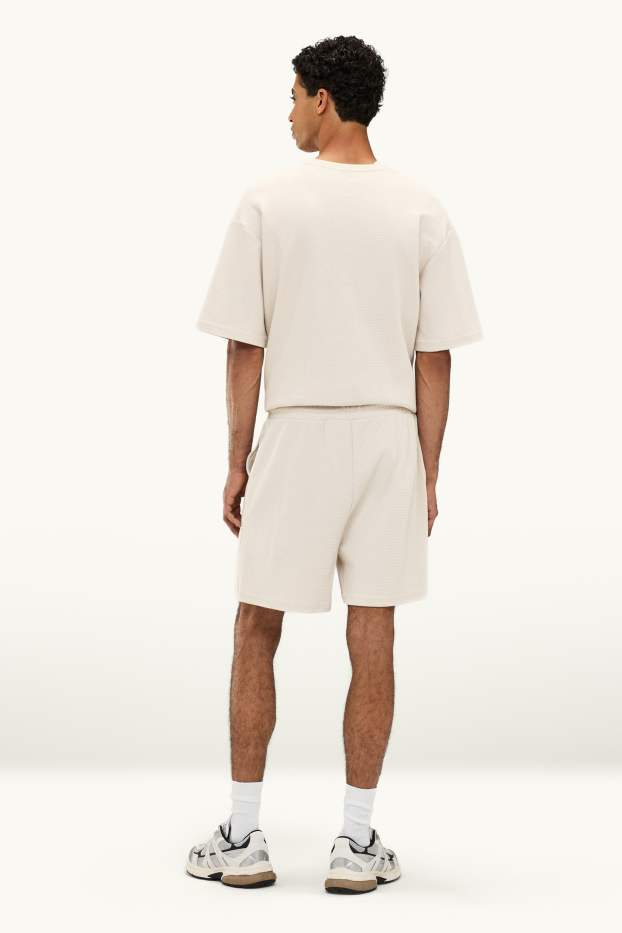 Uomo - Shorts di felpa - beige chiaro
