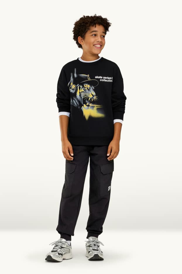 Kinderen: jongens - Joggingbroek - zwart