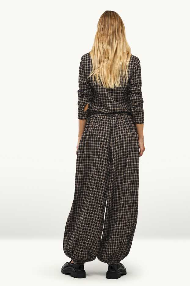 Dona - Pantalons orientals - mid waist - barrel leg - de quadres - negre/beix