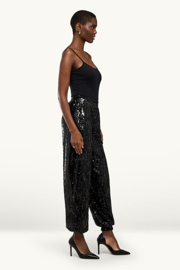Dames - Paillettenbroek - high waist - balloon leg - zwart / zilver