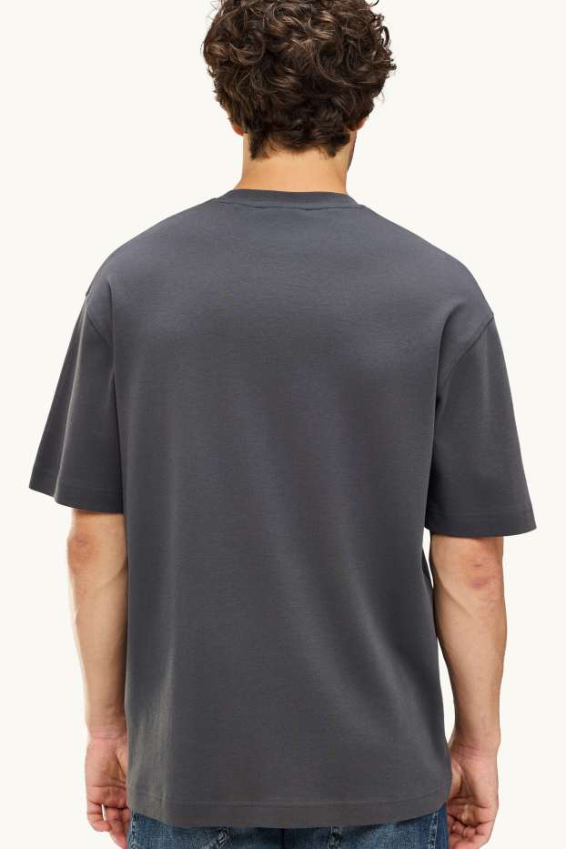 Uomo - T-shirt - relaxed fit - nero