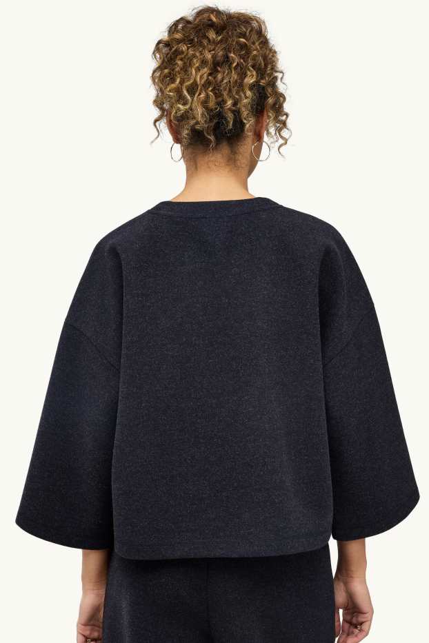 Dona - Dessuadora oversized - blau fosc jaspiat