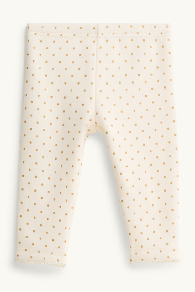 Baby: meisjes - Babylegging - gevoerd met pluche - gestippeld - crèmekleurig