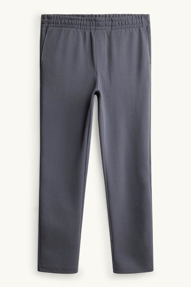 Uomo - Pantaloni sportivi - regular fit - tessuto tramato - grigio scuro