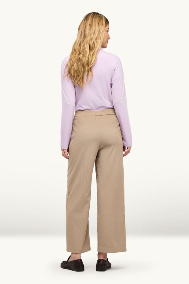 Donna - Pantaloni in velluto a coste - vita media - gamba ampia - beige