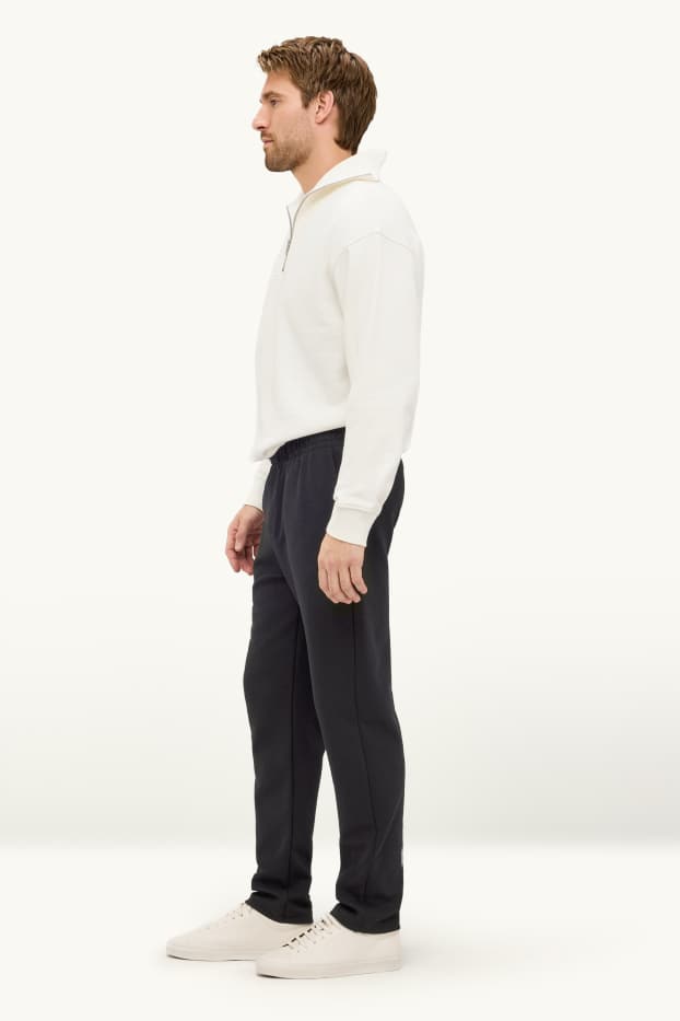Hommes - Pantalon de jogging - regular fit - finition texturée - noir