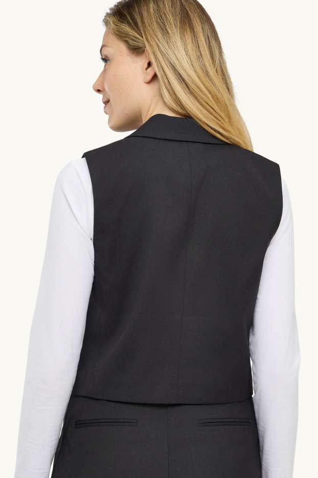 Dona - Armilla formal - entallada - negre