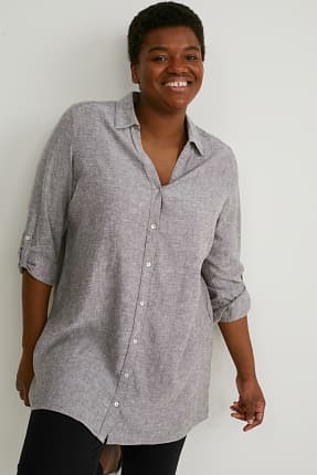 Grandes tailles: Toujours rayonnante avec un chemisier de C\u0026A