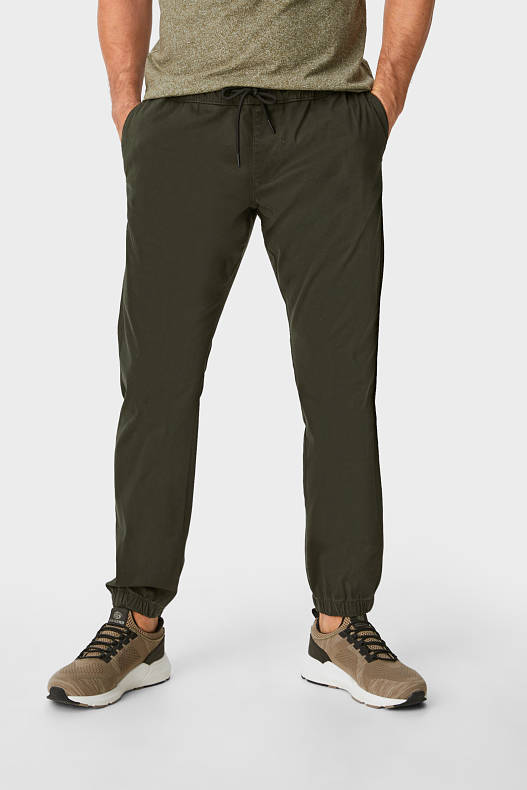 Uomo - Pantaloni sportivi - tapered fit - verde scuro