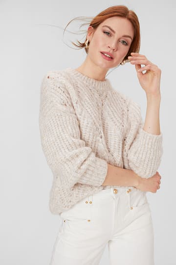 Knitted jumper with openwork pattern