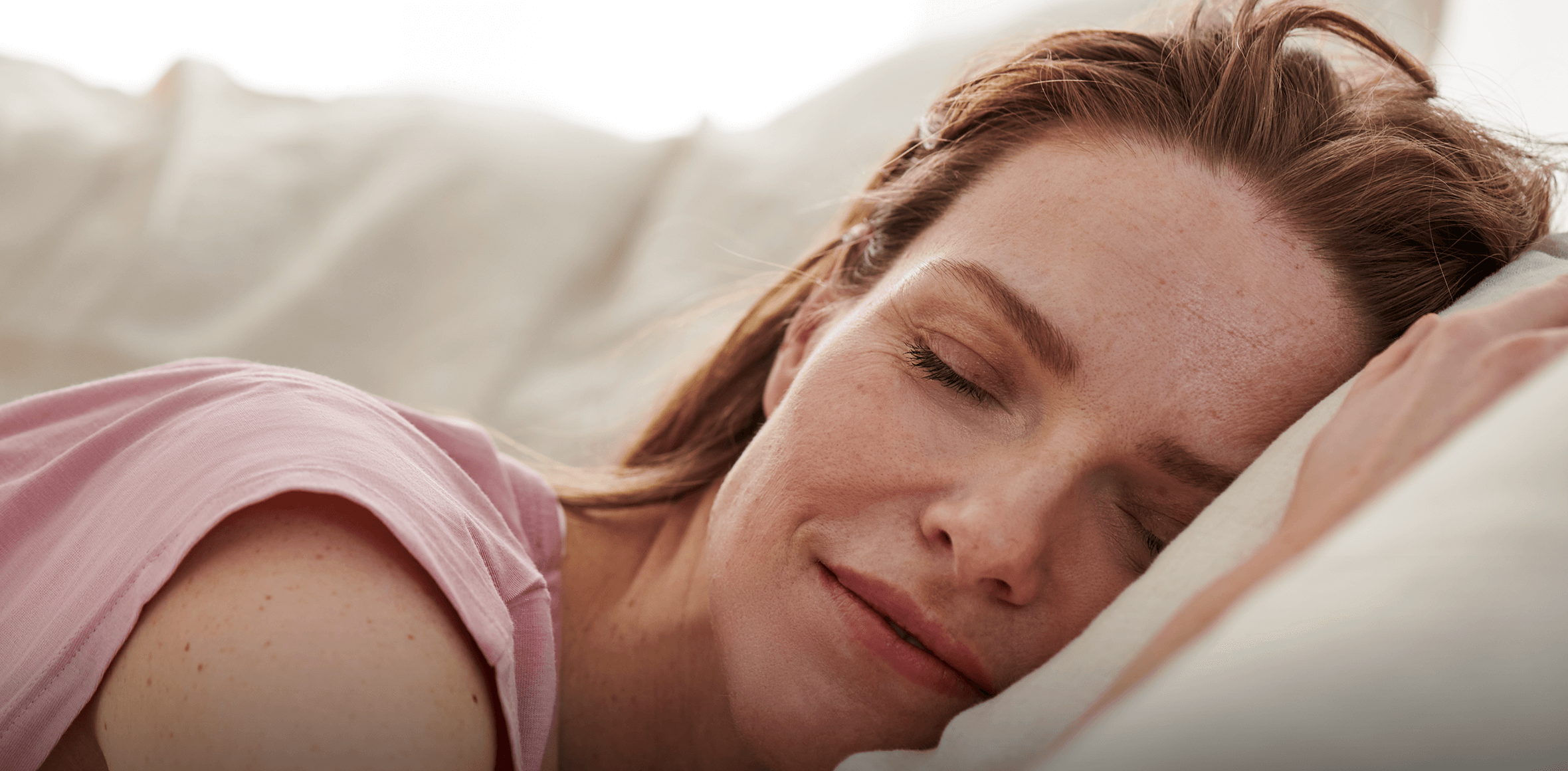 New mum enjoys a much-deserved nap in her snug breastfeeding clothing.