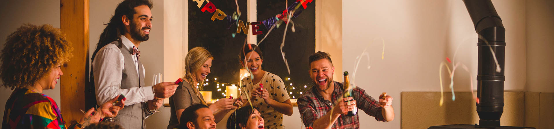 New Year’s Eve: A group of friends celebrating a New Year’s Eve party together.