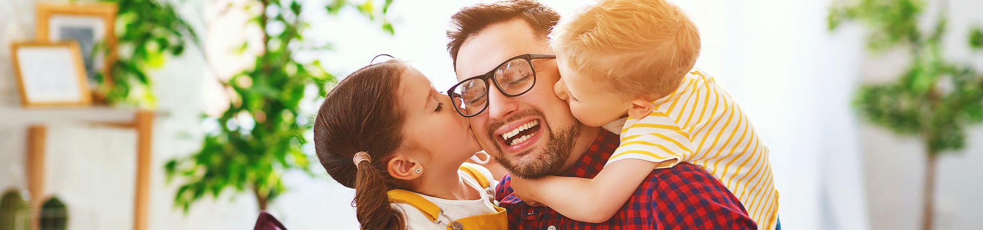 Father’s Day gift - children give their dad a gift.