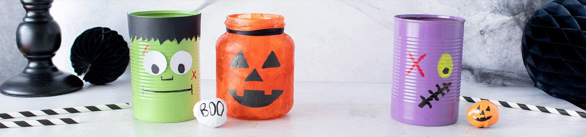Make your own Halloween decorations: different crafted Halloween decorations on a table.
