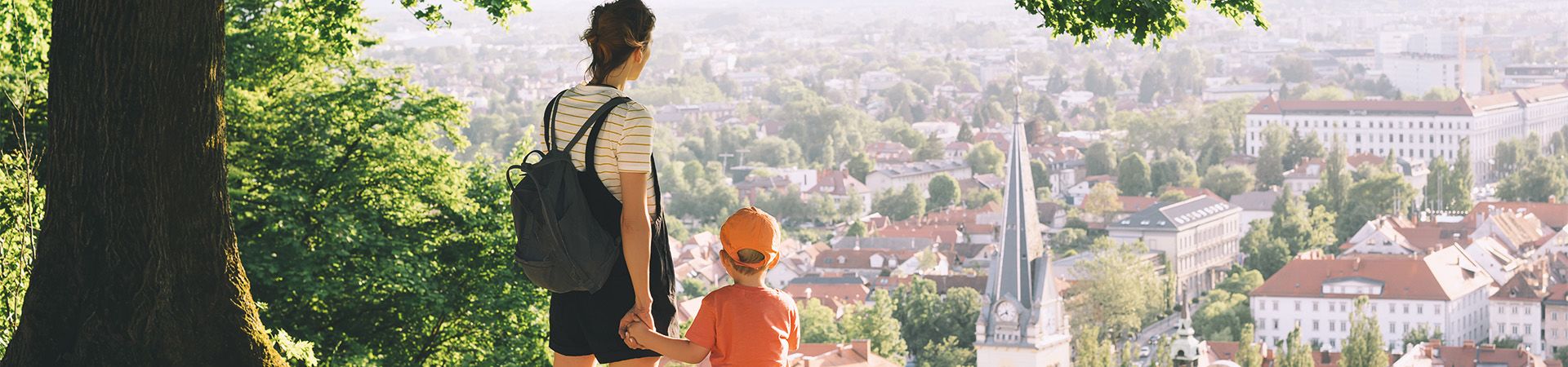 Sustainable holidays: a mother and her son take a small break from wandering around Ljubljana.