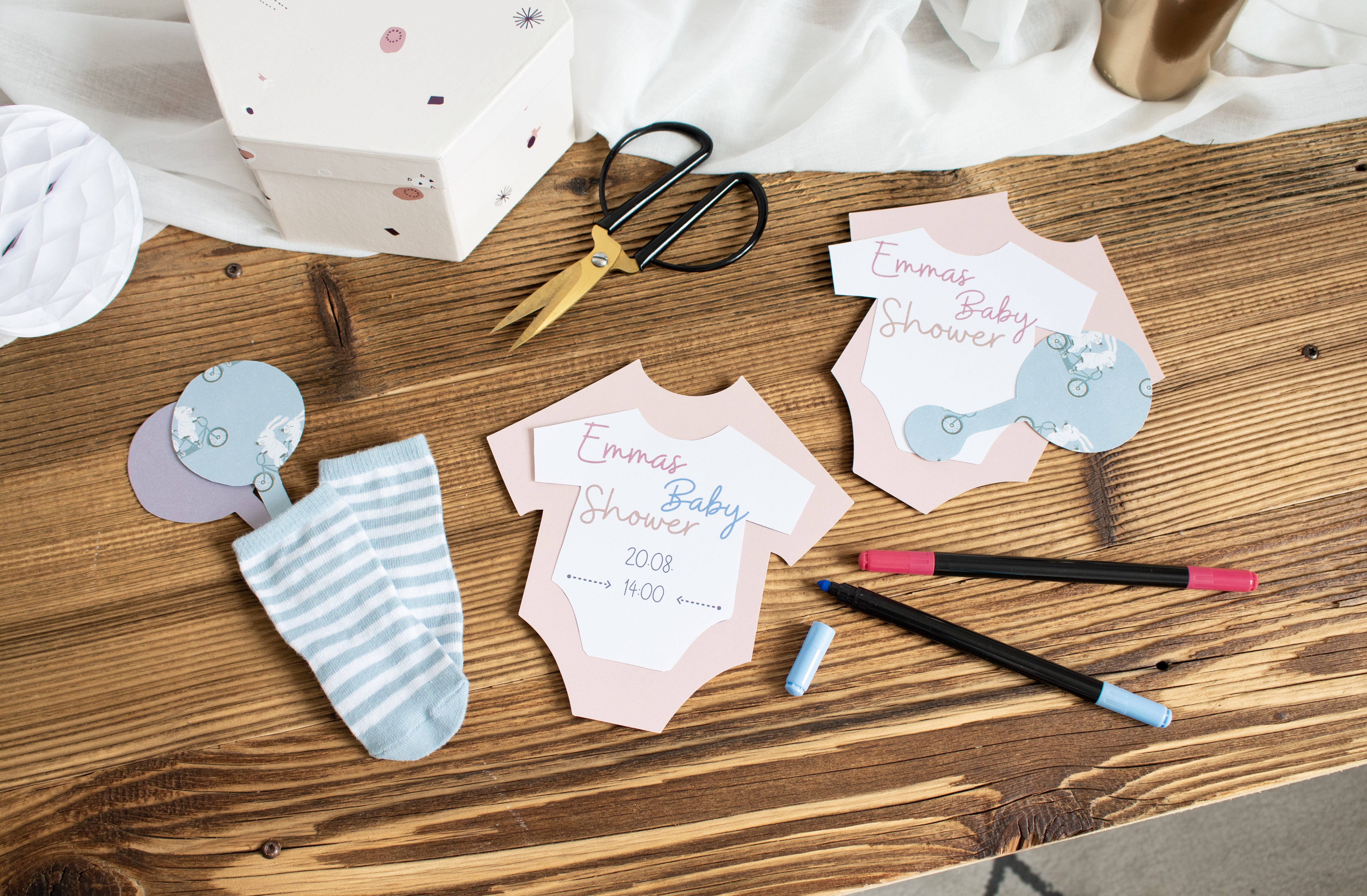 A homemade baby shower invitation.