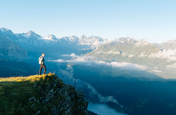 Long-distance hiking - hikers enjoy the mountain view.