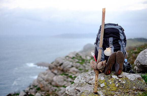 Long Distance Hiking Europe - hiking backpack with a Scallop Shell on the Way of St. James.