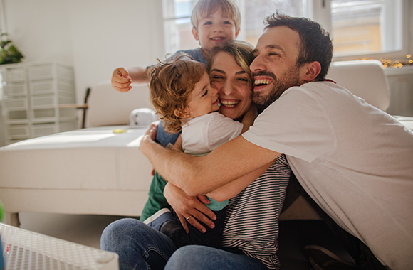 Family hug on Father's Day.