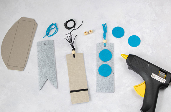 Hot glue gun and parts for the DIY bookmark. Hot glue gun and parts for the DIY bookmark.