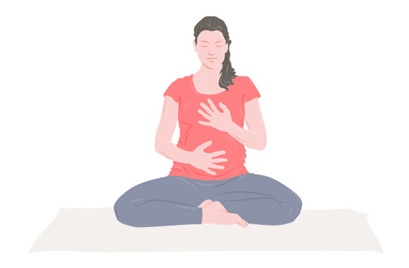 Pregnancy yoga – woman performs a short meditation. Pregnancy yoga – woman performs a short meditation.