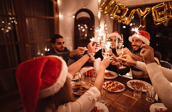 New Year’s Eve customs: group toasts together with champagne. New Year’s Eve customs: group toasts together with champagne.