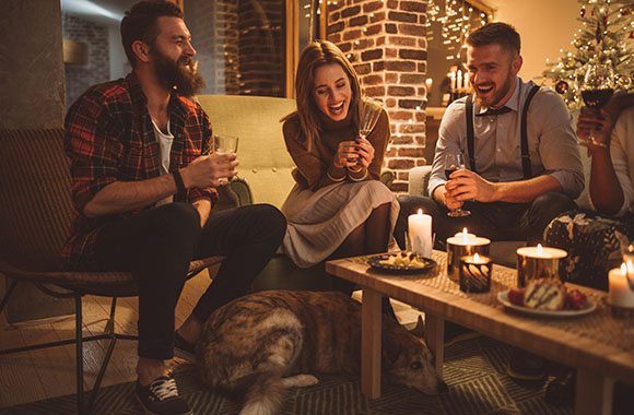 New Year’s Eve games: a group of friends review the year. New Year’s Eve games: a group of friends review the year.