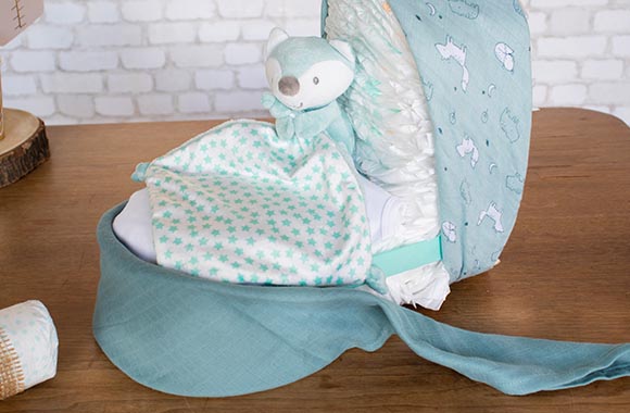 Wrap a flannel cloth around the nappies to stabilise them.