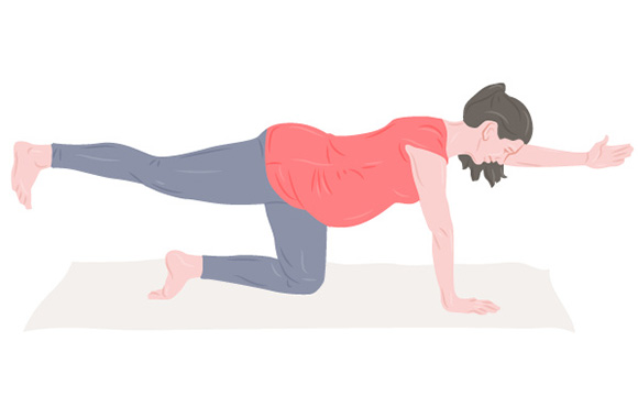 Pregnancy yoga – woman performing diagonal bipedal stand. Pregnancy yoga – woman performing diagonal bipedal stand.