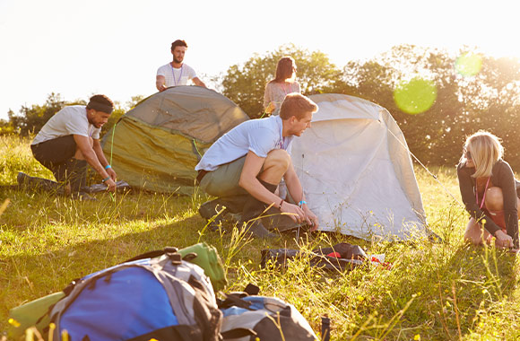 Festival-checklist: festivalgoers setting up their tents. Festival-checklist: festivalgoers setting up their tents.