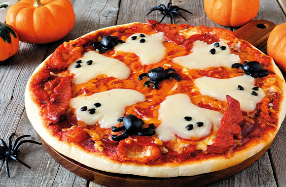 Halloween recipe for a spooky ghost pizza. Halloween recipe for a spooky ghost pizza.