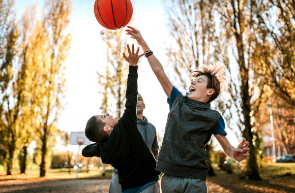 Gift for 10-year-old boy: boys playing basketball together. Gift for 10-year-old boy: boys playing basketball together.