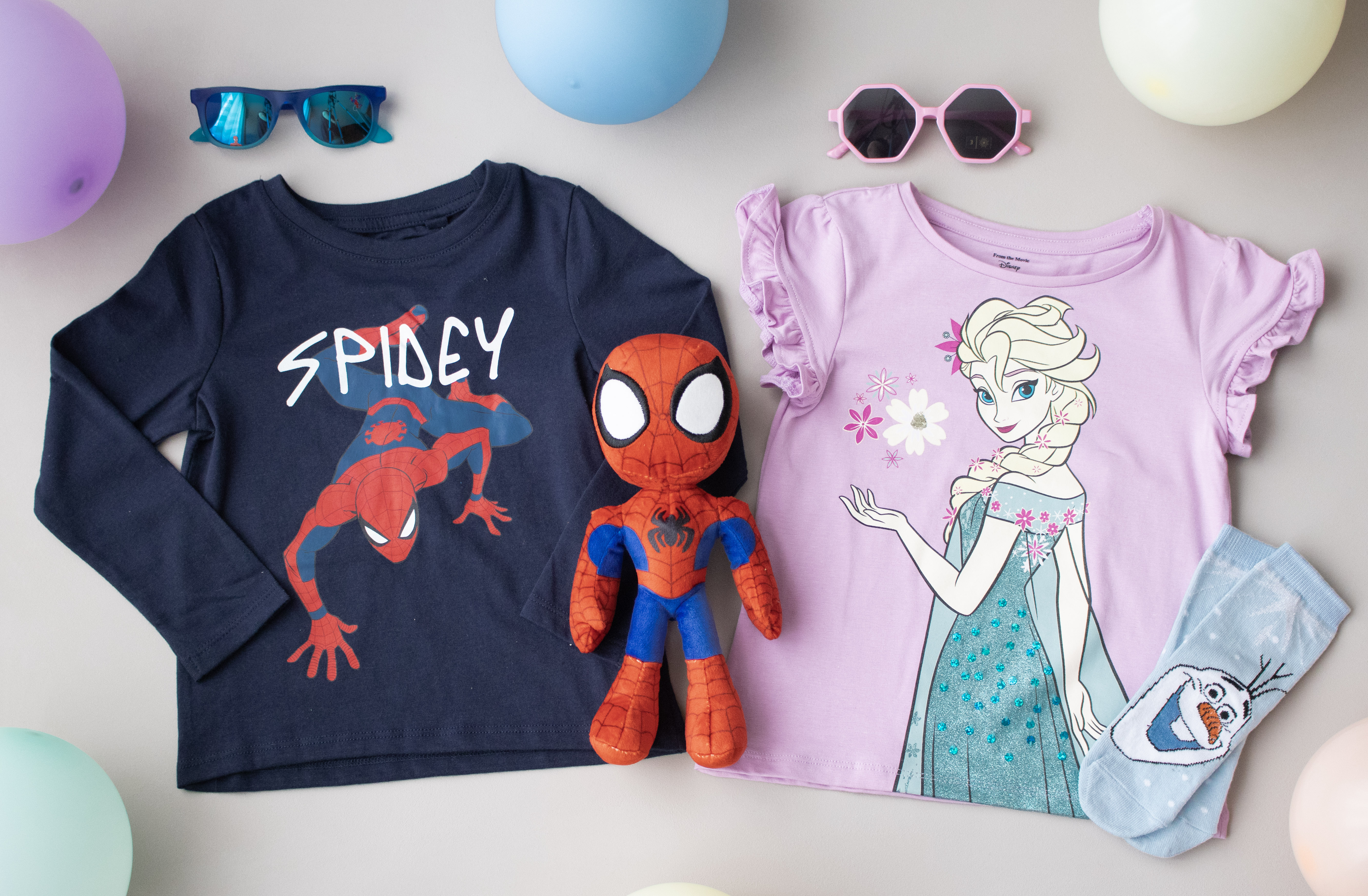 Gifts for 6-year-olds: clothes and accessories from Spider-Man and the Ice Queen.