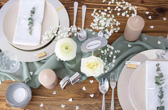 Silver wedding anniversary decoration ideas: close-up of a table setting. Silver wedding anniversary decoration ideas: close-up of a table setting.