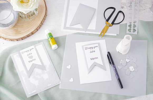 Craft materials needed for the fun silver wedding invitations.