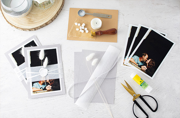 Craft materials for the silver wedding invitation with a nostalgic charm.