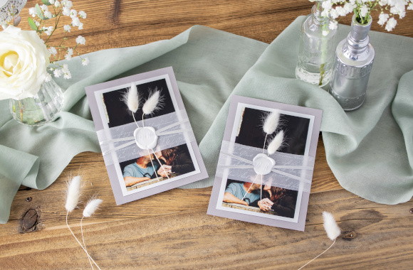 Silver wedding invitations: Invitation card with a wedding photo of the happy couple.
