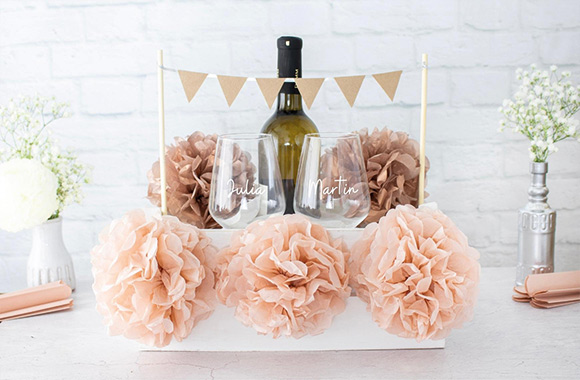 Last-minute silver wedding anniversary gift: a wrapped gift basket for the happy couple. Last-minute silver wedding anniversary gift: a wrapped gift basket for the happy couple.