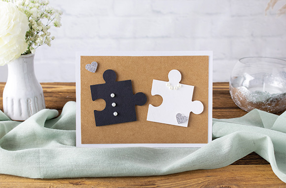 Silver wedding anniversary cards: greetings card with puzzle pieces. Silver wedding anniversary cards: greetings card with puzzle pieces.