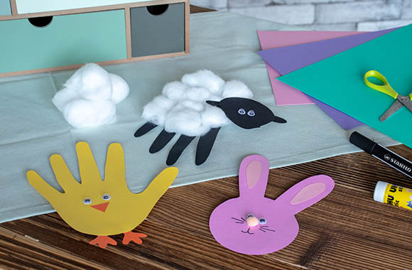 Making Easter bunnies - You can make Easter animals from cute handprints.
